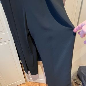 Two piece jumpsuit and balero jacket.